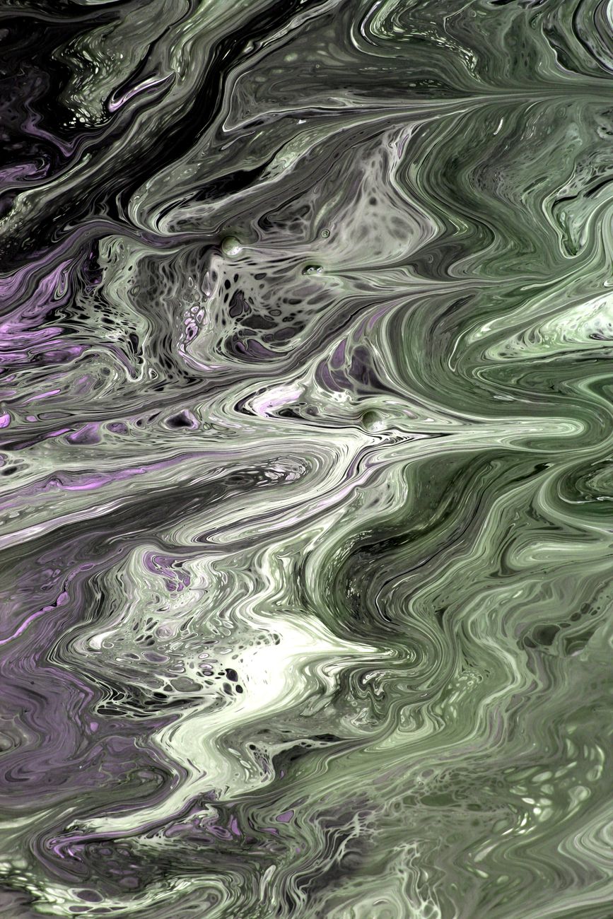 Swirls of green, white and violet paint