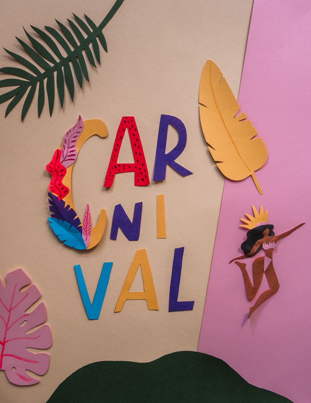 Paper-cut lettering spelling Carnival with leaves
