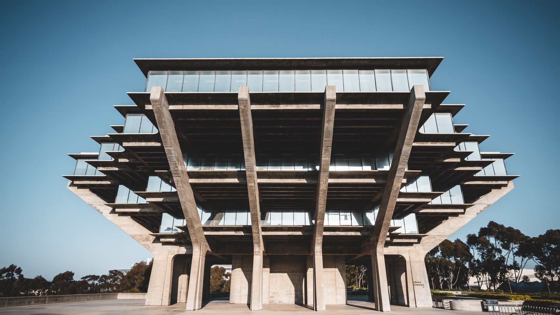 Brutalist library building against a blue sky